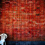 Typical Chair With Brick Wall