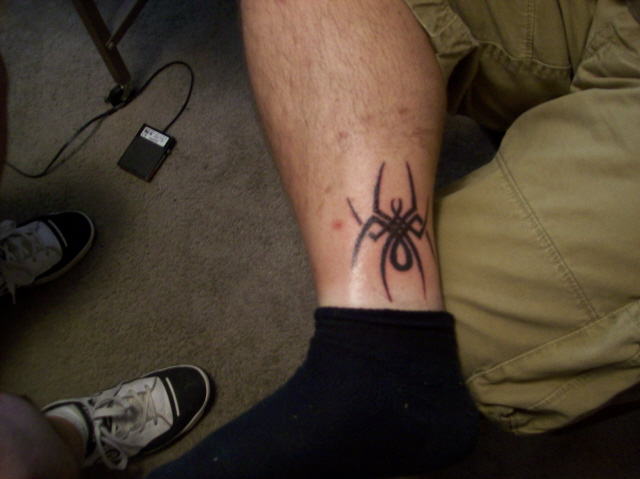 Dads tribal spider tattoo