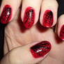 black and red spiderweb nail design