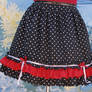 Black skirt white dots