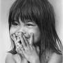 Pencil portrait of Nhu with a hidden smile