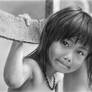 Pencil portrait of Nhu with a fence
