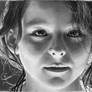 Pencil portrait of an uplit girl