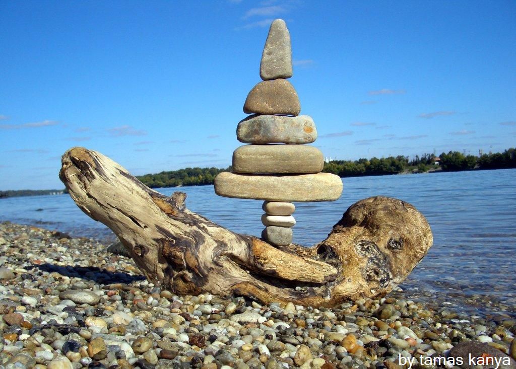 driftwood stone balance sailboat by tamas kanya