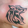 Tribal wolf tattoo - green
