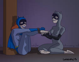 Batgirl tickled by Catwoman