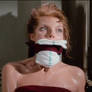 Samantha Eggar gagged