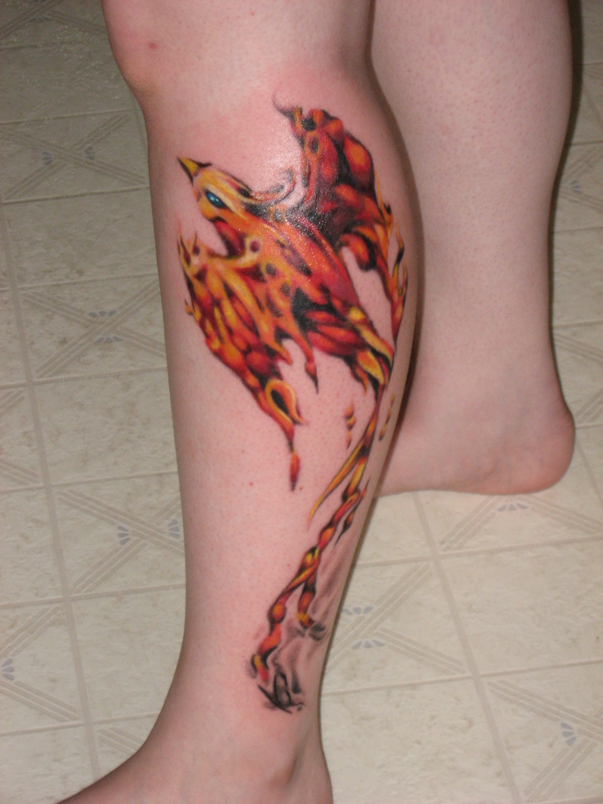 phoenix tattoo ankle