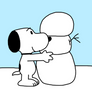 Snoopy making a snowman