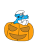 Smurf seated on a pumpkin