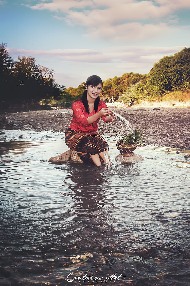 Villagers Girl on River