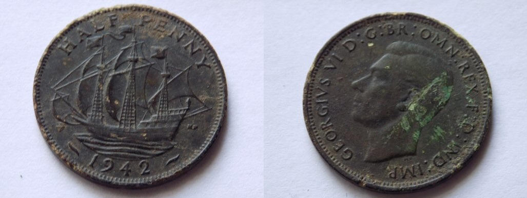 metal detecting find (1942 half penny)