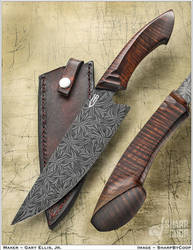 Polymorph Damascus Chefs knife. 