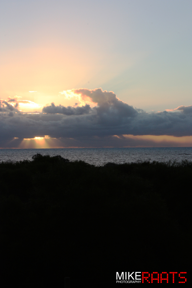 Sunset Behind the Clouds