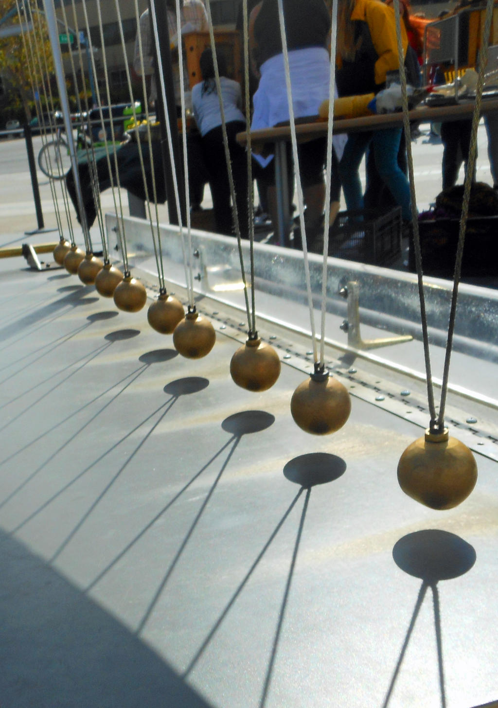 In The Shadow Of Newton's Cradle