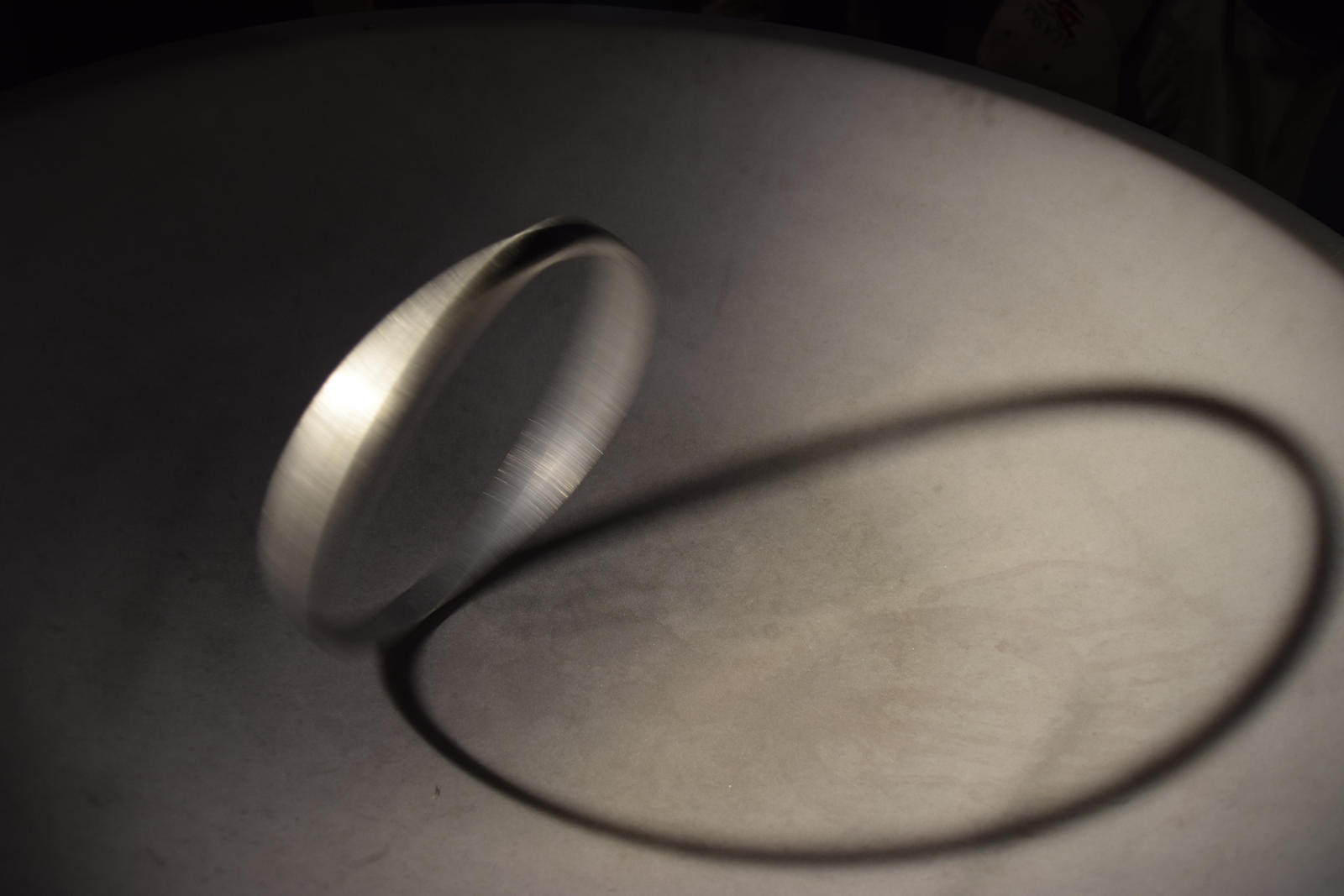 Spinning Ring In Light And Shadow