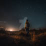 Man watching at starry sky during sunset