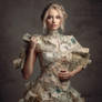Woman in dress made of money. Photography