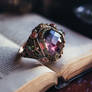 Jewelry ring with gem, lying on a book