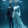 Couple wearing fashion clothes under water