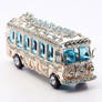 Silver bus figurine with blue crystals