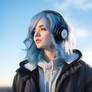 Girl with blue hair, on a background of sky