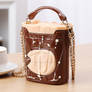 Fashionable handbag in style of coffee with milk