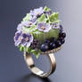 Jewelry ring with polymer cake and flowers