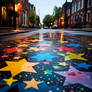 Colourful stars painted on street road