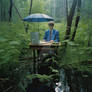 Guy in suit with umbrella sitting in forest marsh