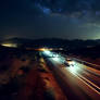 Car on the Road with star trails view 2