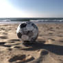 soccer ball on the beach 2