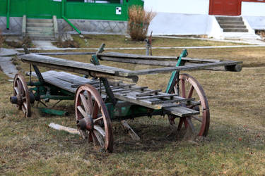 Old cart, standing in the courtyard of the Romania