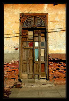 Shadow Across The Quilted Door