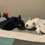 Toothless and Light Fury plushies