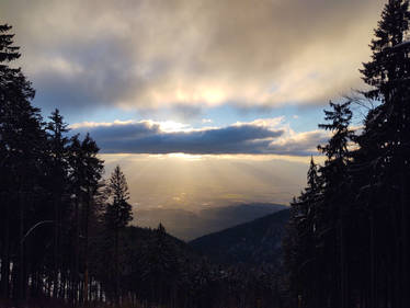 View from the hill to the clouds and sunrays