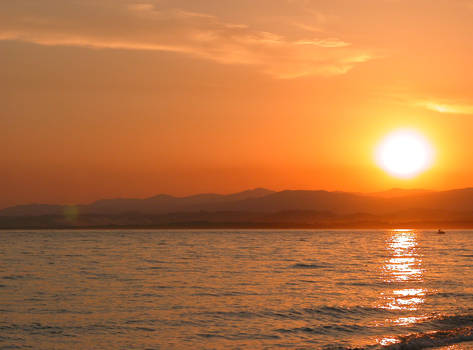 Waverunner fly over red Sunset