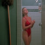 Stunning Erika Eleniak takes a shower in swimsuit