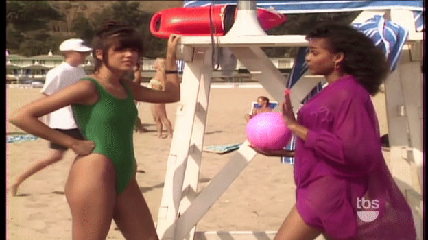 Sexy Kelly Kapowski in green one piece swimsuit