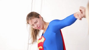 Nuclear Woman has fun as she punishes Superwoman