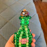 Green beaded bottle