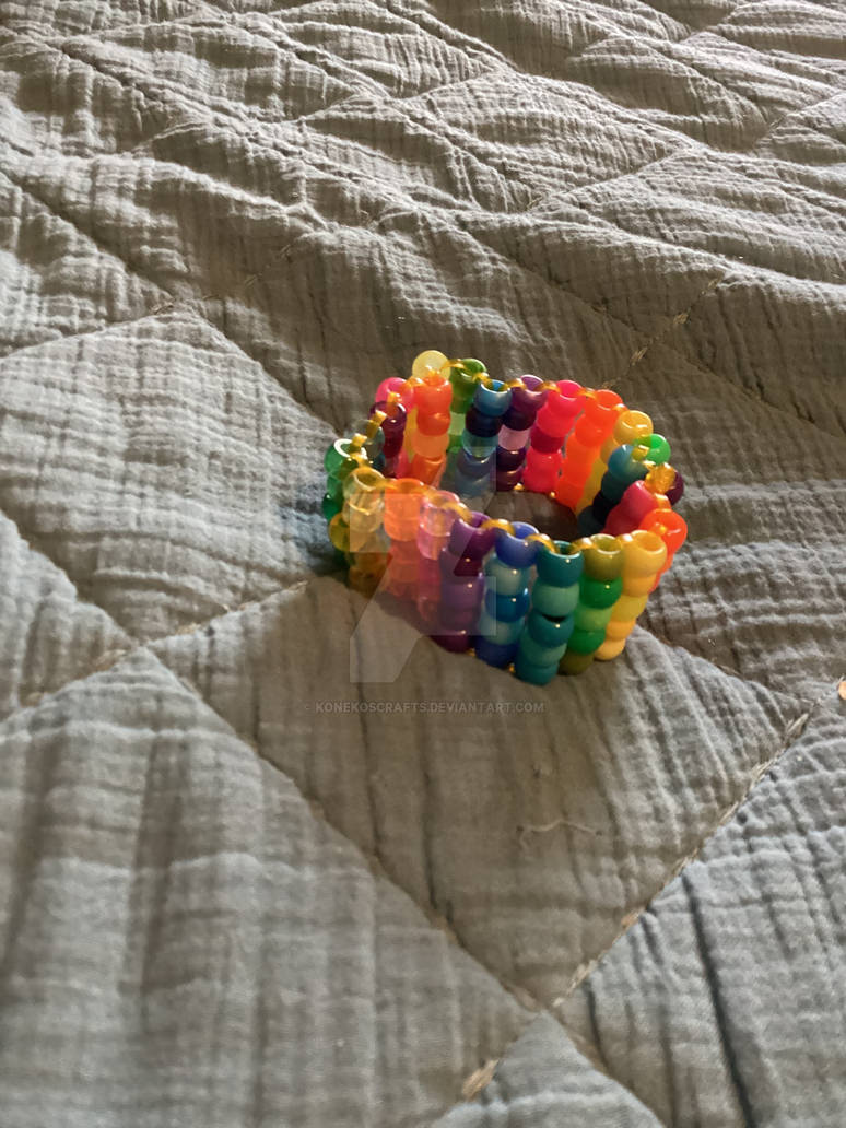 Rainbow ladder stitch cuff by konekoscrafts on DeviantArt