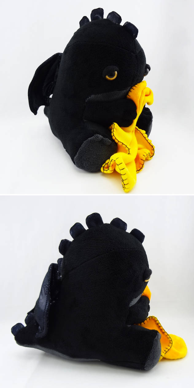 Sleepy yellow eyed black dragon by Koreena