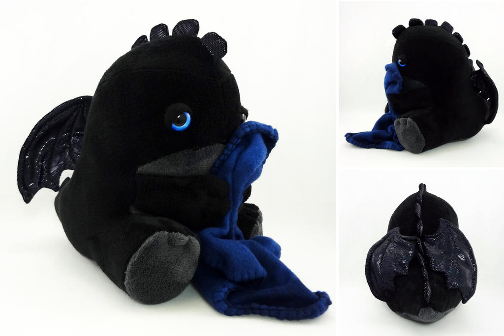 Sleepy blue eyed black dragon by Koreena