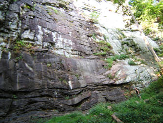 James looks up the cliff