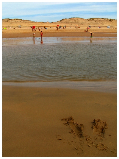 Feet in the sand.