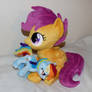 Scootaloo with her very own Rainbow Dash plush!
