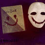 My mask, notebook and a smiley face for cosplay.