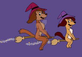 Sasha and Bess ride broomsticks