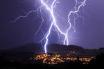 Lightning Strike Above the Village by FlorentCourty